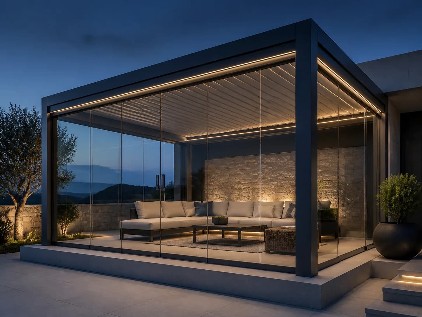 Pergola en aluminium et verre illustrant le savoir-faire de HM Aluminium